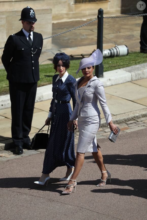 Abigail Leigh Spencer et Priyanka Chopra - Les invités arrivent à la chapelle St. George pour le mariage du prince Harry et de Meghan Markle au château de Windsor, Royaume Uni, le 19 mai 2018. 