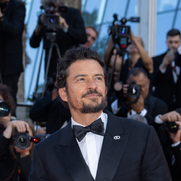 Orlando Bloom - Montée des marches du film " Elémentaire " pour la cérémonie de clôture du 76ème Festival International du Film de Cannes, au Palais des Festivals à Cannes. Le 27 mai 2023 © Olivier Borde / Bestimage 
