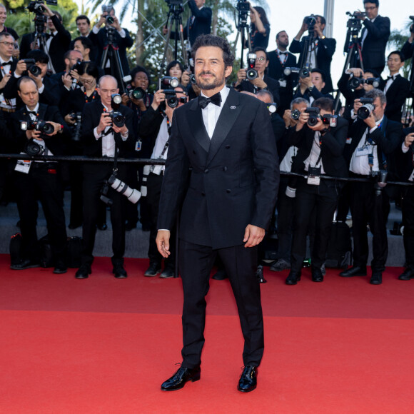 Orlando Bloom - Montée des marches du film " Elémentaire " pour la cérémonie de clôture du 76ème Festival International du Film de Cannes, au Palais des Festivals à Cannes. Le 27 mai 2023 © Olivier Borde / Bestimage 
