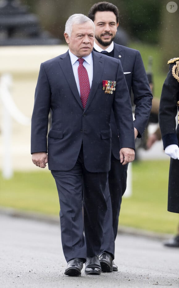 Le roi Abdallah II de Jordanie et son fils le prince Hussein ben Abdallah - Le roi Charles III d'Angleterre assiste à la 200ème édition de la Sovereign's Parade (Parade du souverain) à l'académie militaire royale Sandhurst à Camberley, le 14 avril 2023. 