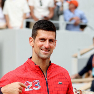Un beau moment en famille pour Novak Djokovic, qui entre encore un peu plus dans la légende de son sport
Novak Djokovic - Novak Djokovic remporte les Internationaux de France de tennis de Roland Garros 2023 face à Casper Ruud (7-6 [7-1], 6-3, 7-5) à Paris le 11 juin 2023. Novak Djokovic s'adjuge un 23ème titre record en Grand Chelem et dépasse Rafael Nadal, bloqué à 22 titres et forfait cette année. © Jacovides-Moeau/Bestimage