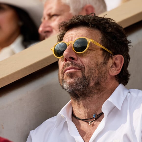 Patrick Bruel - Célébrités en tribunes des Internationaux de France de tennis de Roland Garros 2023 à Paris le 11 juin 2023. © Jacovides-Moreau/Bestimage