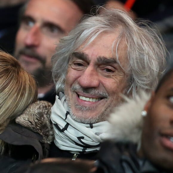 Louis Bertignac et Laeticia au quart de finale de la Coupe de France de football entre le PSG et l'AS Monaco (2-0) au Parc des Princes à Paris le 4 mars 2015