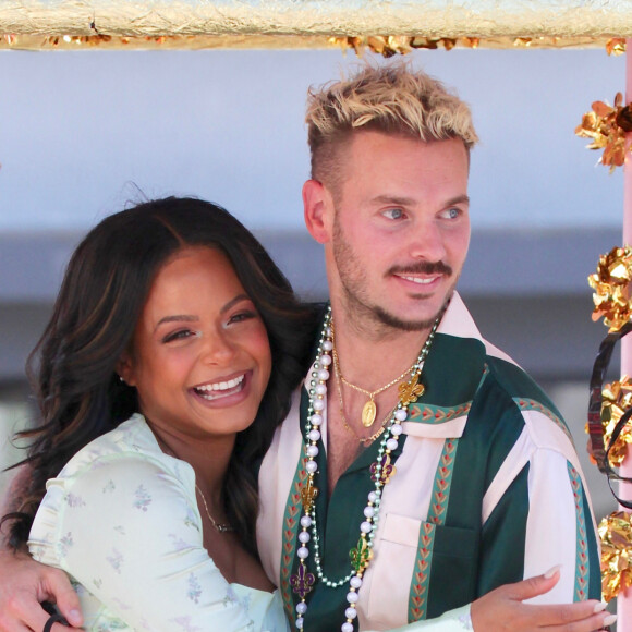 Christina Milian, enceinte, fait la promotion de son food truck Beignet Box lors d'une parade à Los Angeles avec son compagnon M Pokora (Matt) le 10 avril 2021. 