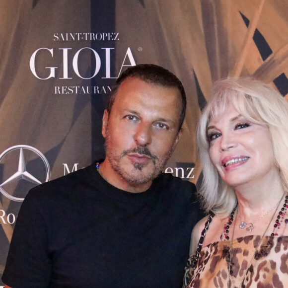 Jean Roch et Amanda Lear - Les people font la fête à la Gioia à Saint-Tropez. Eté 2020. © Arthur Wilhelm via Bestimage 