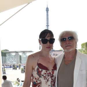 Exclusif - Hugues Aufray et sa compagne Muriel lors du Longines Paris Eiffel Jumping au Champ de Mars à Paris, le 7 juillet 2018. © Borde-Veeren/Bestimage