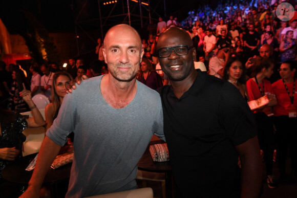 Exclusif - Christophe Dugarry et Lilian Thuram lors de la soirée du grand gala du "Marrakech du Rire 2022" pour la 10ème édition au palais El Badiî à Marrakech, Maroc, le 18 juin 2022. © Rachid Bellak/Bestimage  No Web pour la Belgique et la Suisse