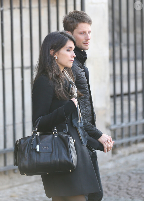 Romain Grosjean et sa femme Marion Jolles - Sorties de la messe en hommage à Christophe de Margerie en l'église Saint-Sulpice à Paris le 27 octobre 2014.