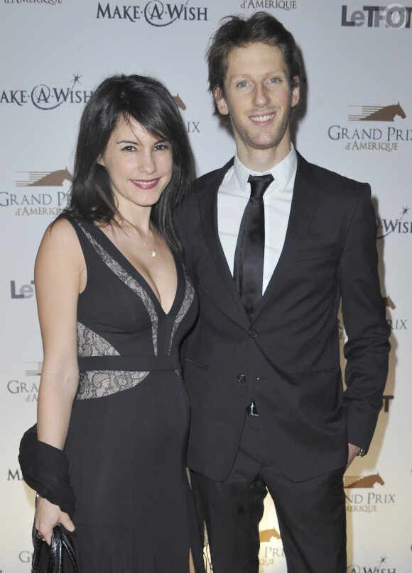 Romain Grosjean et sa femme Marion Jolles enceinte - Diner de Gala du 92eme Grand Prix d' Amerique au Grand Palais a Paris le 26 Janvier 2013.