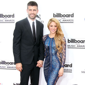Elle évoque notamment la période très compliquée qu'elle a vécu lors de leur séparation
Gerard Piqué et sa compagne la chanteuse Shakira - Photocall à l'occasion de la cérémonie des Billboard Music Awards 2014 à Las Vegas le 18 mai 2014