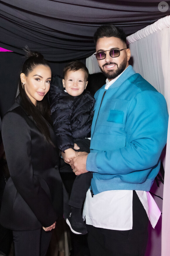 Exclusif - Nabilla Benattia, son mari Thomas Vergara et leur fils Milann - Nabilla Benattia, son mari Thomas Vergara et leur fils Milann posent lors de l'avant première du documentaire "Nabilla sans filtre" (Amazon Prime Vidéo) à Paris le 22 Novembre 2021. © Jack Tribeca / Bestimage