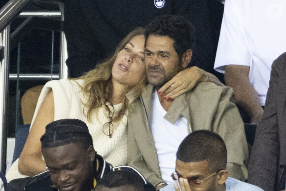 Mélissa Theuriau et son mari Jamel Debbouze - People assistent au match aller de la Ligue des Champions entre le Paris Saint-Germain et la Juventus (2-1) au Parc des Princes à Paris le 6 septembre 2022. 