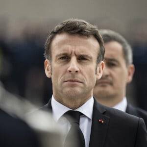 Le président Emmanuel Macron rend hommage aux trois policiers tués, lors d'une cérémonie à l'école nationale de police de Roubaix, le 25 mai 2023, en présence du ministre de l'Intérieur, G.Darmanin. Paul, Steven et Manon ont trouvé la mort lors d'une collision avec un véhicule roulant à contre-sens, le 21 mai 2023. 