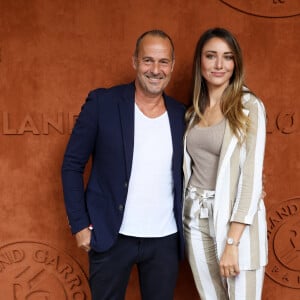 Roger Erhart et sa compagne Delphine Wespiser, Miss France 2012 au village (jour 10) lors des Internationaux de France de Tennis de Roland Garros 2022 à Paris, France, le 31 mai 2022. © Dominique Jacovides/Bestimage 