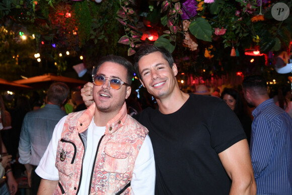 Andreas Kastrinos et Valentin Lucas à la soirée d'anniversaire de Malika Ménard au "Medellin Jardin" à Paris, le 23 juillet 2023. © Rachid Bellak / Bestimage