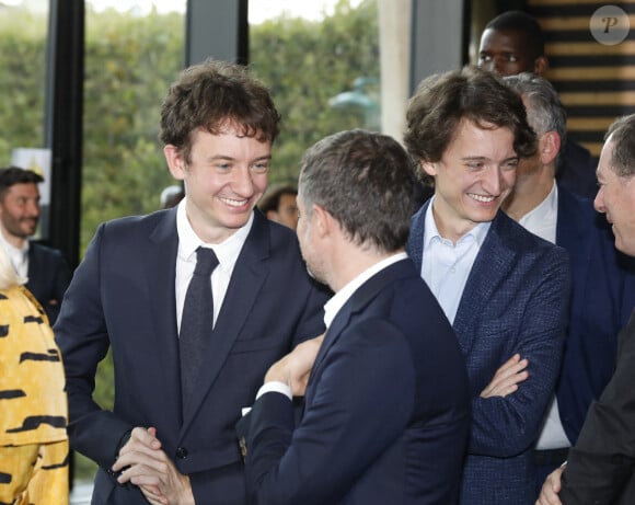 Il s'agit du premier partenariat pour LVMH.
Frédéric Arnault et Jean Arnault lors d'une conférence de presse à Paris, le 24 juillet 2023 © Marc Ausset-Lacroix/Bestimage