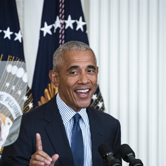 Le président des Etats-Unis Joe Biden invite Barack Obama et Michelle Obama à dévoiler leurs portraits à la Maison Blanche, le 7 septembre 2022. Les oeuvres ont été réalisées par Robert McCurdy et Sharon Sprung. 