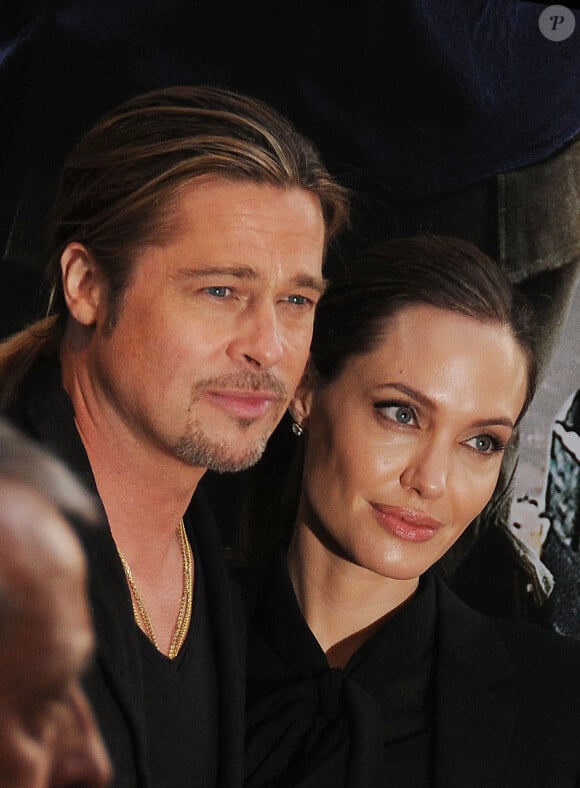 L'interprète de "Maléfique" serait même partante pour participer à une sorte de réunion de conciliation.
Brad Pitt et Angelina Jolie à l'avant-première de "World War Z" à Paris. © Agence / Bestimage