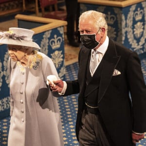 La reine Elizabeth II d'Angleterre et le prince Charles, prince de Galles - La reine d'Angleterre va prononcer son discours d'ouverture de la session parlementaire à la Chambre des lords au palais de Westminster à Londres, Royaume Uni, le 11 mai 2021. 