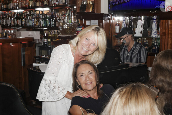 Exclusif - Pascale Perez, Béatrice Mangin lors du showcase de Marc Fichel à l'Hôtel Bar Le Sube à Saint-Tropez le 7 août 2023. © Jack Tribeca / Bestimage