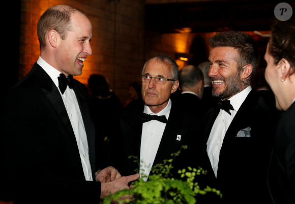 Les deux hommes ont décidé d'envoyer un message d'encouragement aux joueuses anglaises avant la finale de la Coupe du monde féminine
 
Le prince William, duc de Cambridge, David Beckham, son fils Brooklyn lors de la première mondiale de la série Netflix "Our Planet" au Musée d'histoire naturelle de Londres le 4 avril 2019.