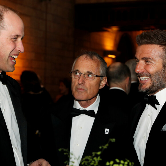 Les deux hommes ont décidé d'envoyer un message d'encouragement aux joueuses anglaises avant la finale de la Coupe du monde féminine
 
Le prince William, duc de Cambridge, David Beckham, son fils Brooklyn lors de la première mondiale de la série Netflix "Our Planet" au Musée d'histoire naturelle de Londres le 4 avril 2019.