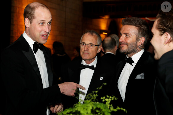 Le prince William, duc de Cambridge, David Beckham, son fils Brooklyn lors de la première mondiale de la série Netflix "Our Planet" au Musée d'histoire naturelle de Londres le 4 avril 2019.