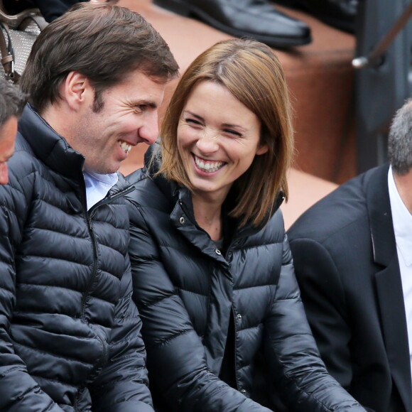 Isabelle Ithurburu et son mari Gonzalo Quesada - People aux Internationaux de France de tennis de Roland Garros à Paris, le 28 mai 2014 lors du match entre Jo-Wilfried Tsonga et Jürgen Melzer. 