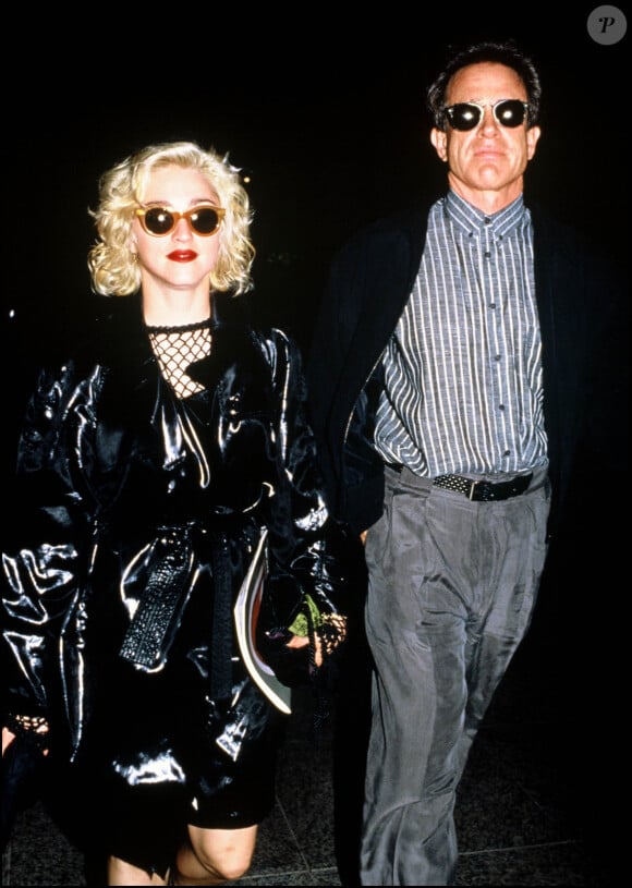 Ainsi qu'avec la célèbre chanteuse.
Archives - Madonna et Warren Beatty.