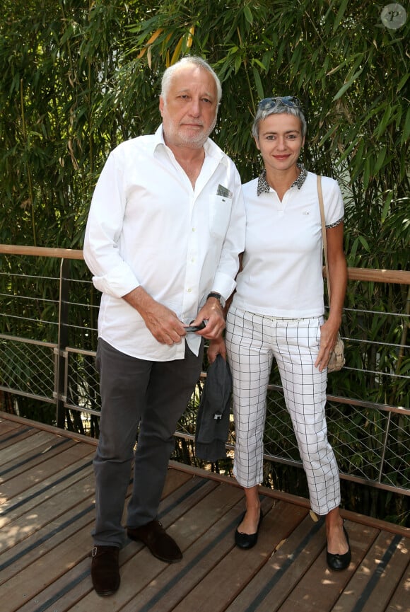 François Berléand et Alexia Stresi - People au village des Internationaux de France de tennis de Roland Garros à Paris, le 31 mai 2014. 