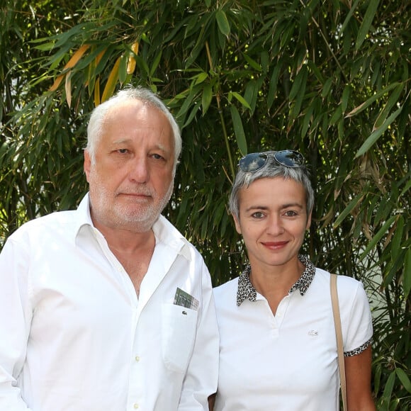 François Berléand et Alexia Stresi - People au village des Internationaux de France de tennis de Roland Garros à Paris, le 31 mai 2014. 