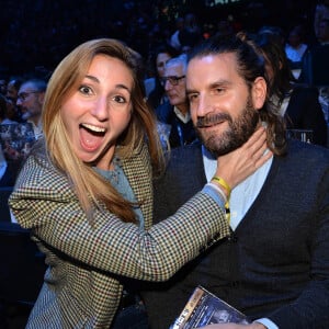 Marie Portolano et son mari Grégoire Ludig lors du gala de boxe Univent à l'AccorHotels Arena de Paris pour le championnat du monde WBA. © Veeren / Bestimage 