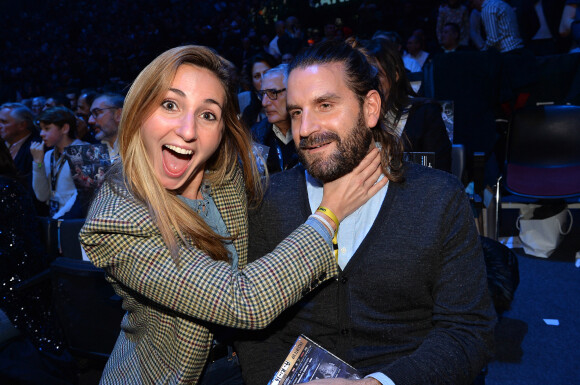 Marie Portolano et son mari Grégoire Ludig lors du gala de boxe Univent à l'AccorHotels Arena de Paris pour le championnat du monde WBA. © Veeren / Bestimage 