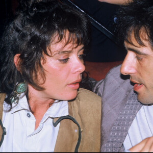 Archives - Gérard Lanvin et sa femme Jennifer lors d'une soirée au Palace à Paris. 1986.