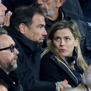 Laure Boulleau enceinte et son compagnon Bruno Cheyrou - People des les tribunes de la coupe du Monde de Rugby France 2023 - Match de quart de finale "France-Afrique du Sud (28-29)" au Stade de France à Saint-Denis 15 octobre 2023. © Moreau-Jacovides/Bestimage