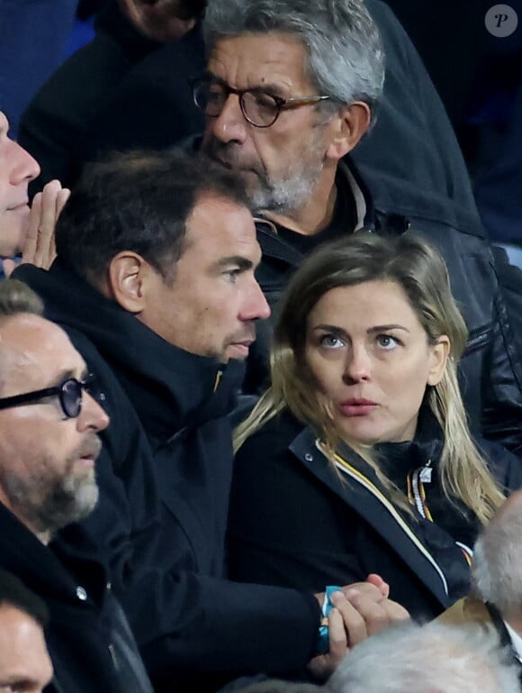 Laure Boulleau enceinte et son compagnon Bruno Cheyrou - People des les tribunes de la coupe du Monde de Rugby France 2023 - Match de quart de finale "France-Afrique du Sud (28-29)" au Stade de France à Saint-Denis 15 octobre 2023. © Moreau-Jacovides/Bestimage