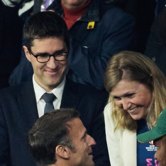 Emmanuel Macron, Yaël Braun-Pivet, Gérald Darmanin - People des les tribunes de la coupe du Monde de Rugby France 2023 - Match de quart de finale "France-Afrique du Sud (28-29)" au Stade de France à Saint-Denis 15 octobre 2023. © Moreau-Jacovides/Bestimage