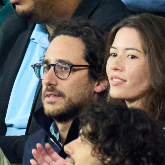 Thomas Hollande et sa femme Emilie Broussouloux - People des les tribunes de la coupe du Monde de Rugby France 2023 - Match de quart de finale "France-Afrique du Sud (28-29)" au Stade de France à Saint-Denis 15 octobre 2023. © Moreau-Jacovides/Bestimage