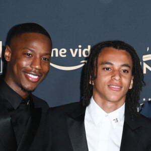 Kylian Mbappé avec son frère Ethan Mbappé et son père Wilfrid Mbappé - Photocall de la cérémonie des Trophées UNFP 2022 au Pavillon Gabriel à Paris le 15 mai 2022. © Coadic Guirec/Bestimage