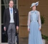 Mais elle fait très attention à son apparence, notamment à ses tenues et à ses cheveux.
Le prince William, prince de Galles, et Catherine (Kate) Middleton, princesse de Galles, lors d'une Garden Party au palais de Buckingham à Londres, Royaume Uni, le 9 mai 2023, pour célébrer le couronnement du roi et de la reine d'Angleterre. 