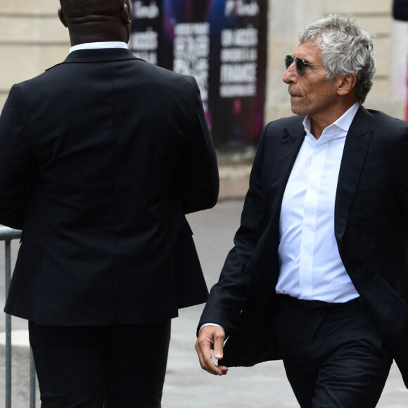 Nagui - Arrivées des célébrités aux obsèques de Jane Birkin en l'église Saint-Roch à Paris. Le 24 juillet 2023 © Jacovides-KD Niko / Bestimage