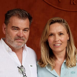 Clovis Cornillac et sa femme Lilou Fogli au village lors des Internationaux de France de tennis de Roland Garros 2023, à Paris, France, le 11 juin 2023.