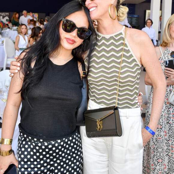 Exclusif - Laeticia Hallyday et sa fille Joy dans l'Espace VIP lors de la 9ème édition du "Longines Paris Eiffel Jumping" au Champ de Mars à Paris, France, le 25 juin 2023. © Perusseau-Veeren/Bestimage 