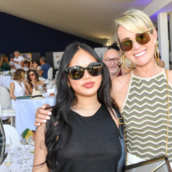 Exclusif - Laeticia Hallyday et sa fille Joy dans l'Espace VIP lors de la 9ème édition du "Longines Paris Eiffel Jumping" au Champ de Mars à Paris, France, le 25 juin 2023. © Perusseau-Veeren/Bestimage 