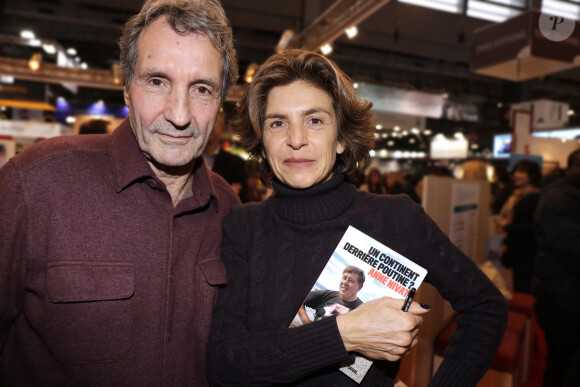 Anne Nivat et son mari Jean-Jacques Bourdin - Salon du livre à la porte de Versailles à Paris le 18 mars 2018. © Cédric Perrin/Bestimage