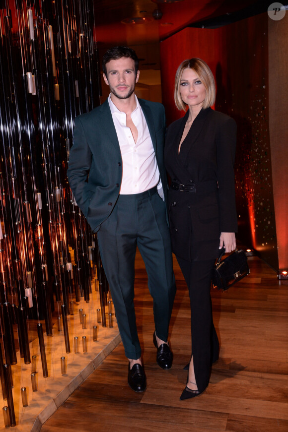 Exclusif - Hugo Philip et sa compagne Caroline Receveur - Soirée de lancement du nouveau parfum Boss "The scent absolute" à l'hôtel Mandarin Oriental à Paris le 13 novembre 2019. © Rachid Bellak/Bestimage 