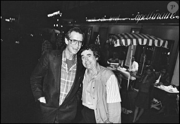 Archives - Anthony Perkins et Terry Jones (des Monty Python" lors de la première du film "Psychose 2" à Paris le 6 juillet 1983