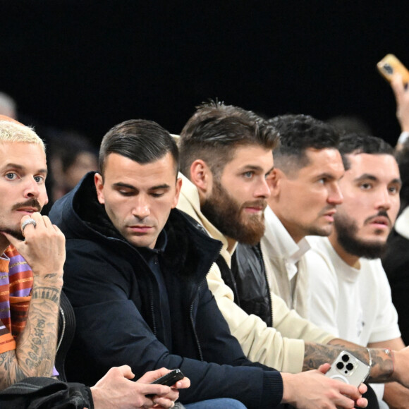M. Pokora (Matt Pokora), Anthony Lopes, Duje Caleta-Car, Dejan Lovren et Rayan Cherki - People assistent au match de basket de la 10ème journée d'Euroligue "LDLC Asvel - Bayern Munich (100-101)" à Lyon le 23 novembre 2023.
