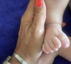 Les internautes ont alors simplement pu s'émouvoir devant les adorables petits pieds de bébé
Karine Ferri a dévoilé une nouvelle photo de son troisième bébé Sasha, une petite fille née le 3 mai 2023. Instagram