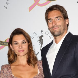 Camille Lacourt réussit un "défi de dingue"

Camille Lacourt et sa compagne Alice Detollenaere - Photocall du 4ème gala de charité de l'association "Les Bonnes Fées" à l'occasion de la campagne mondiale "Octobre Rose" à l'hôtel Peninsula, Paris. © Coadic Guirec/Bestimage